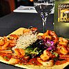 Pacific Coast Dining Company logo